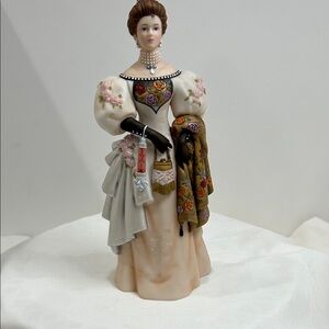Avon Mrs. Albee Award Figurine with White and Red Accents